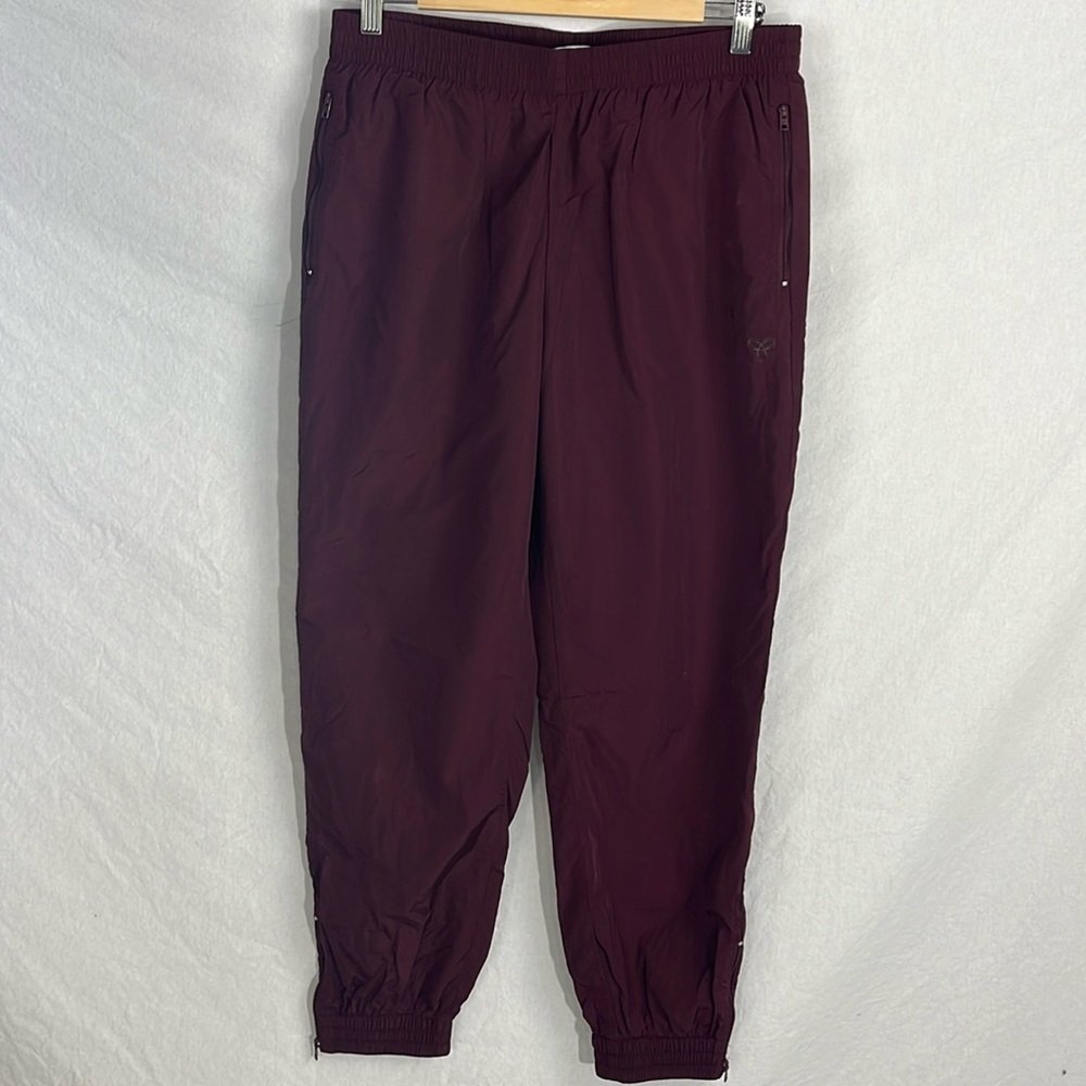 TNA large track pants burgundy red